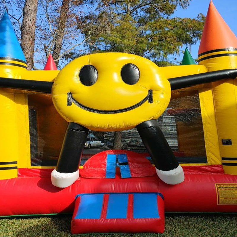 Kids' party rental, a crayon bounce house inflatable for family events in Jacksonville
